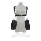 Thigh wrist restraints adjustable leather bondage harness with rings for secure attachment.