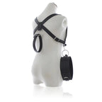 Back view of adjustable leather thigh wrist restraints showcasing professional-grade hardware.