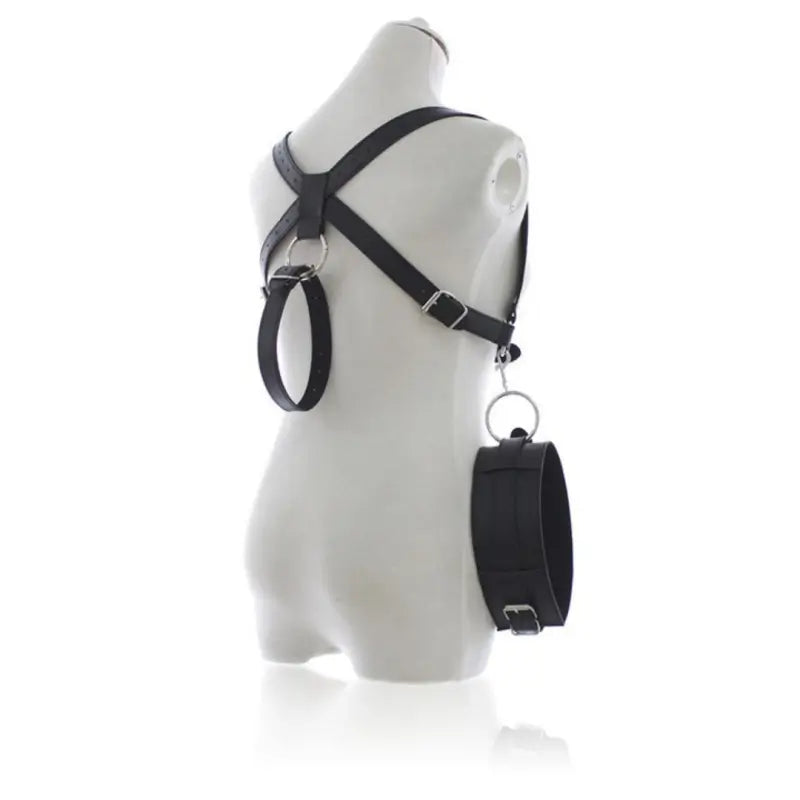 Back view of adjustable leather thigh wrist restraints showcasing professional-grade hardware.