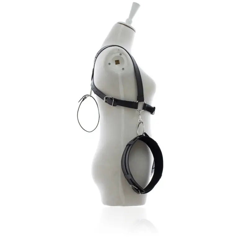 Adjustable leather thigh wrist restraints harness shown on mannequin side view, featuring professional-grade design.