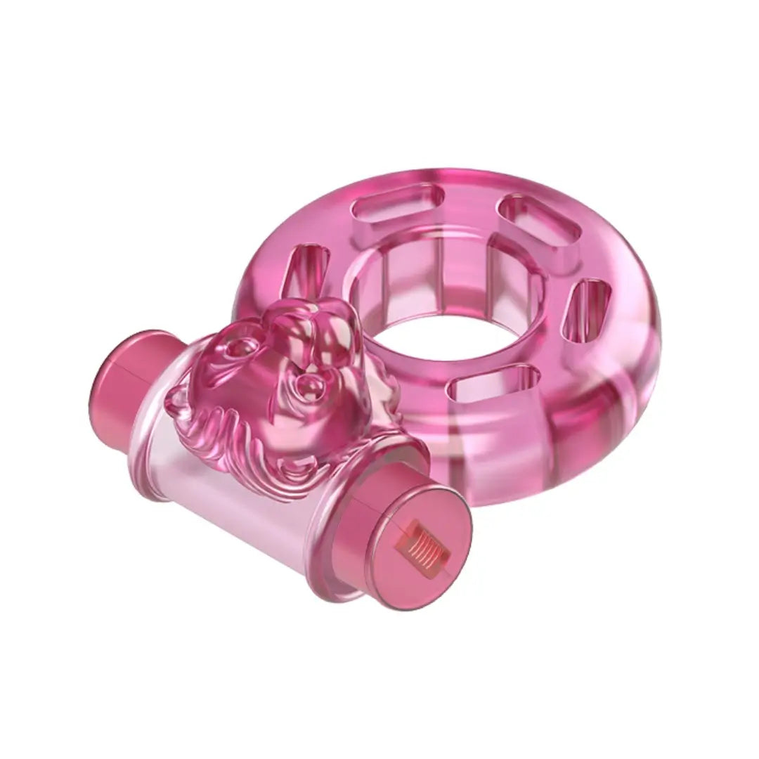 Vibrating cock ring in pink, featuring textured clitoral stimulator for couples' intense pleasure.