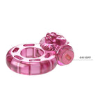 Vibrating Cock Ring: pink clitoral stimulator with on/off switch for couples' intense pleasure.