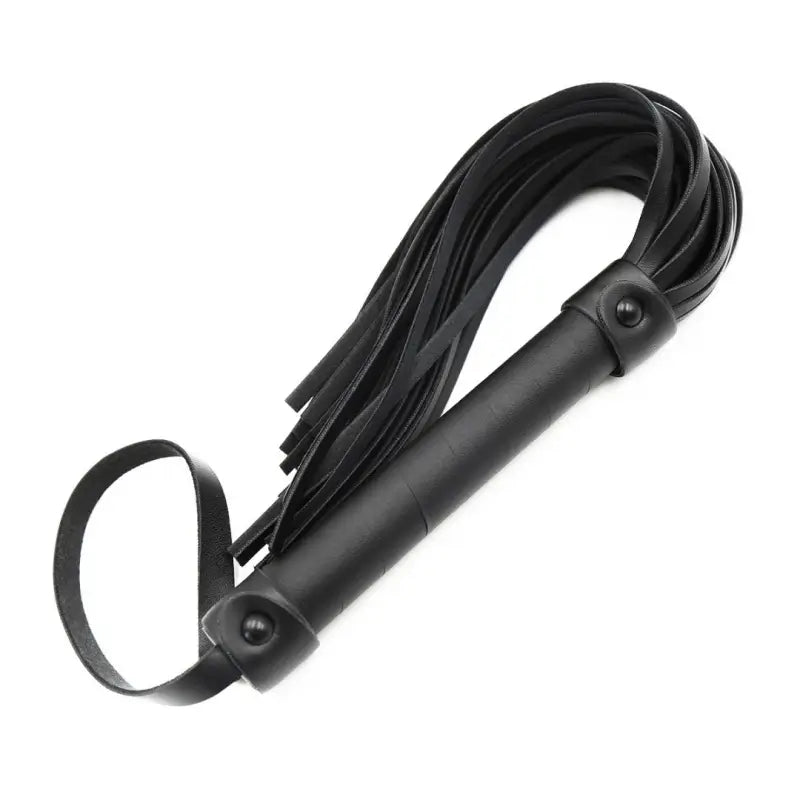 Dominitoy black flogger angled view showing studded handle and wrist loop
