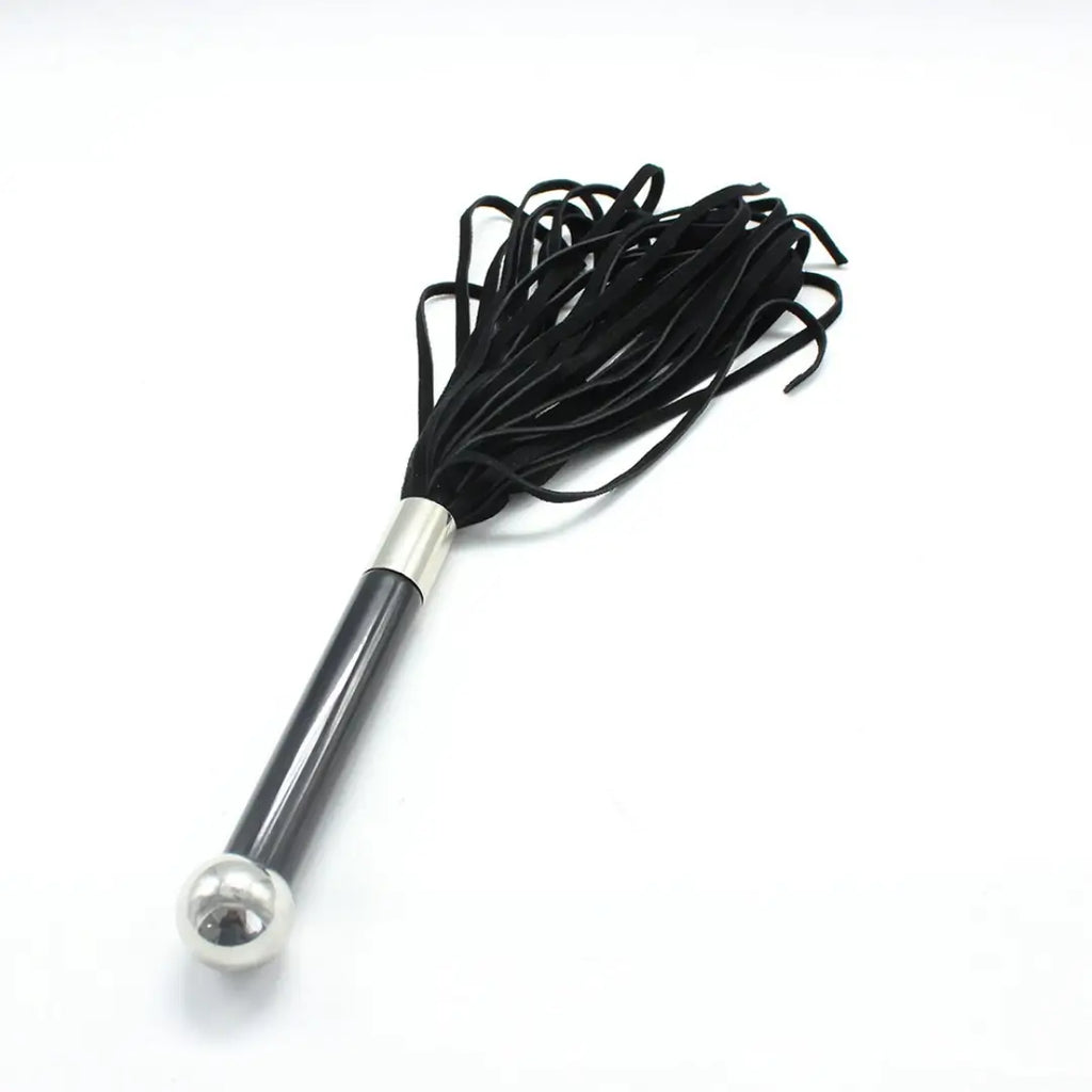 Dominitoy black suede flogger angled view on white background
