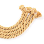 Close-up of Dominitoy rope flogger braided tails with knotted ends