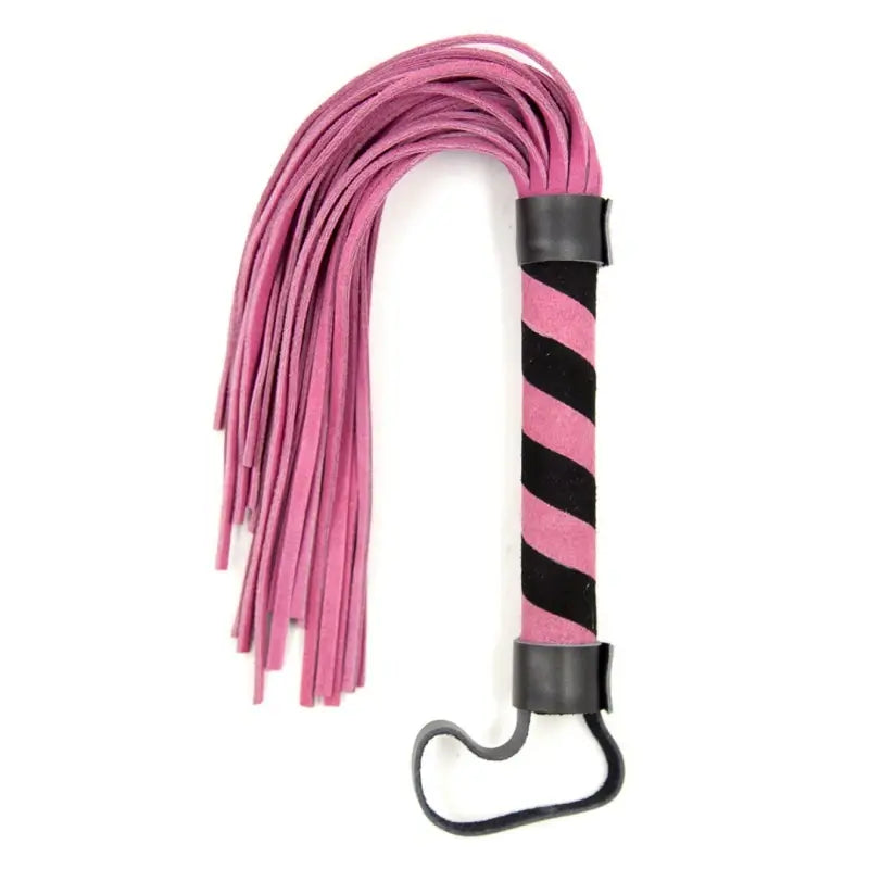 Pink mini suede flogger flat lay with soft suede falls