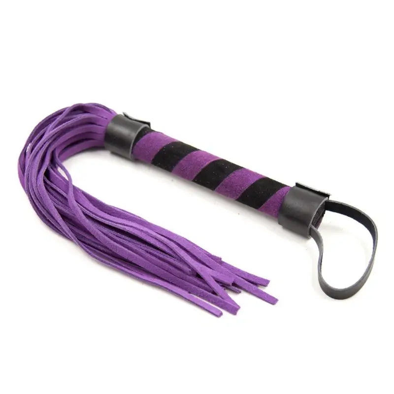 Purple mini suede flogger with black striped suede handle